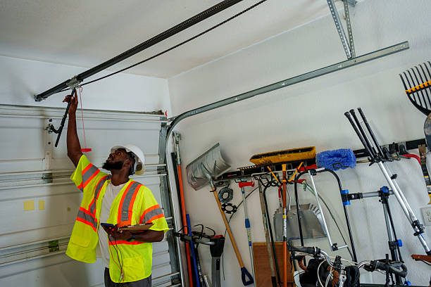 Professional Garage Door Roller Replacement technician working in Garfield, NJ